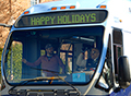 BUS IN HOLIDAY PARADE